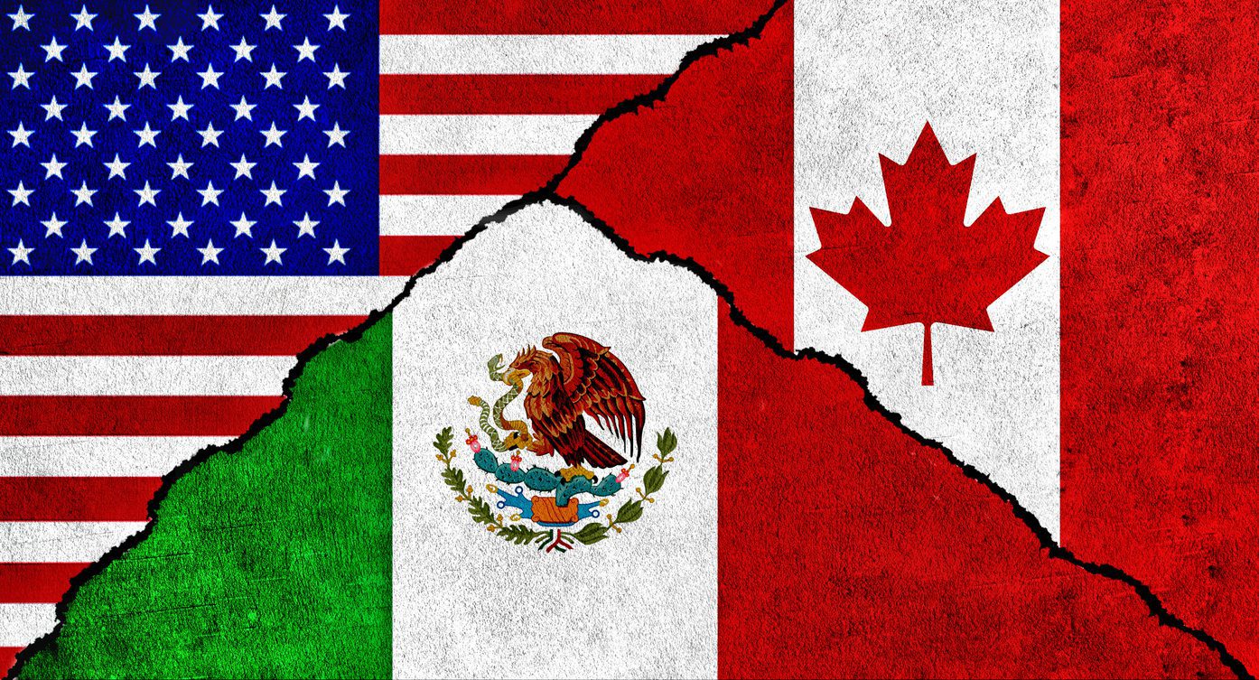 The United States, Mexico and Canada flags are displayed together, symbolizing cross-border shipping under USMCA for full truckload services and less than truckload shipping.